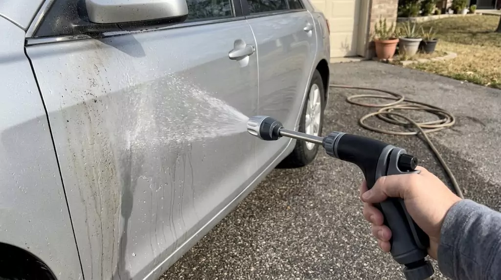 Jetterix test on a silver family sedan — soft fan spray hitting the driver’s door directly